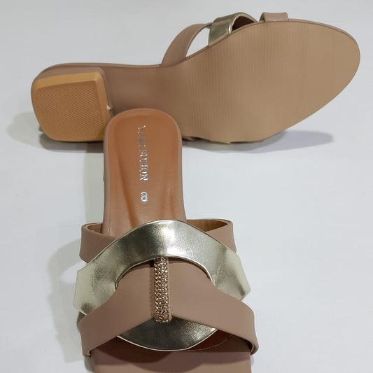 Pair of brown sandals with a gold strap on a white background